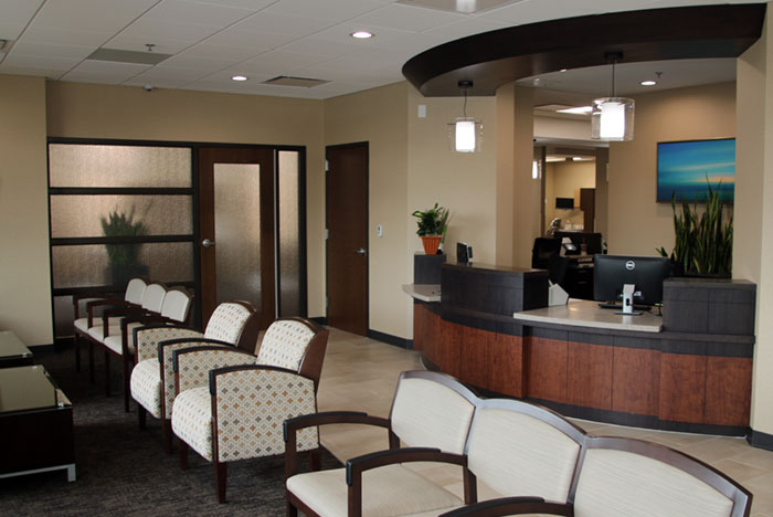 Alsip Dental Associates' reception area is warm and inviting